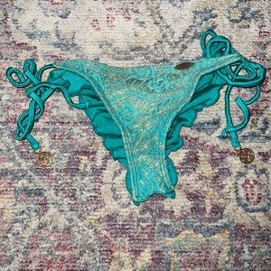 Luli Fama size small teal cheeky ruched bottom size small
